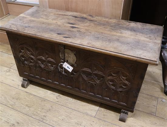 A 17th century style oak coffer W.108cm